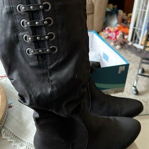 Flat size 9 1/2 over the calf boot black cliffs Fiona about a 16 inch shaft
